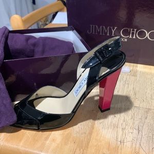 Jimmy Choo 7-1/2.     Worn once  patent  hot pink patent high heel